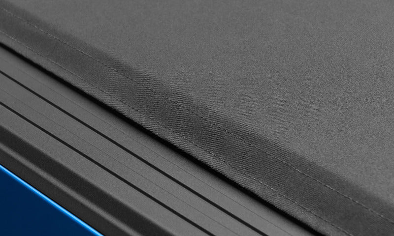 Lund 09-14 Ford F-150 (5.5ft. Bed) Genesis Elite Roll Up Tonneau Cover - Black - Image 6